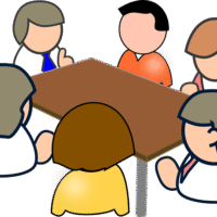 Członkowie debatują na zebraniu